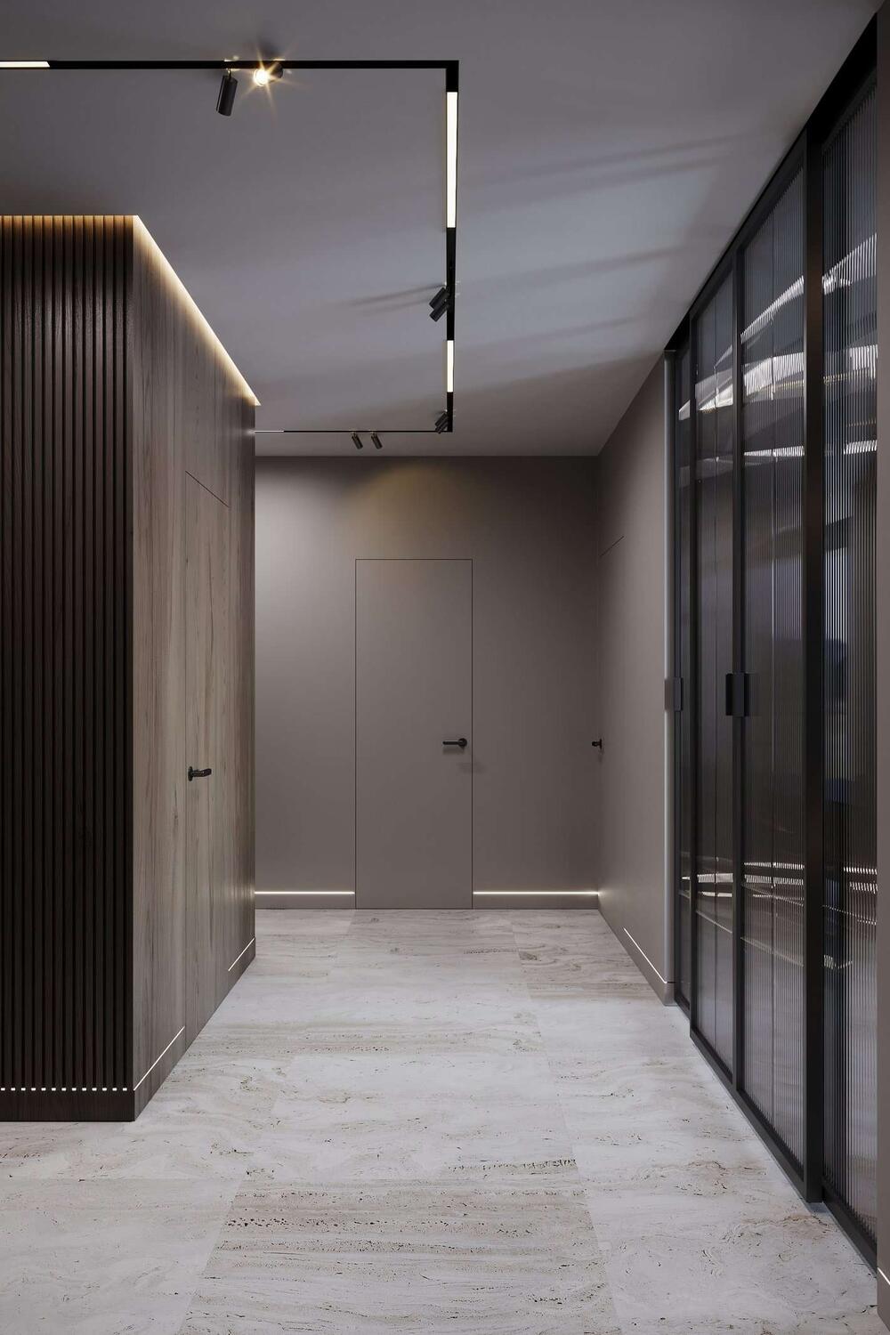 Раздвижные двери со стеклянными вставками и подсветка подчёркивает архитектурные линии интерьера