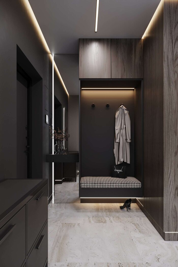 Компактный дизайн с удобными нишами для хранения, тёмные акценты и подсветка добавляют интерьеру глубины